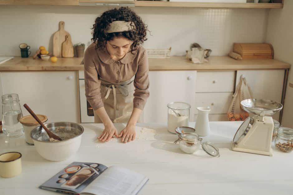 baker using kitchen scale