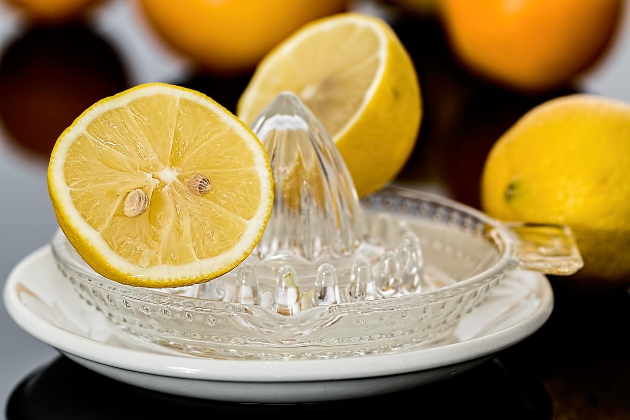 rolling lemon on table